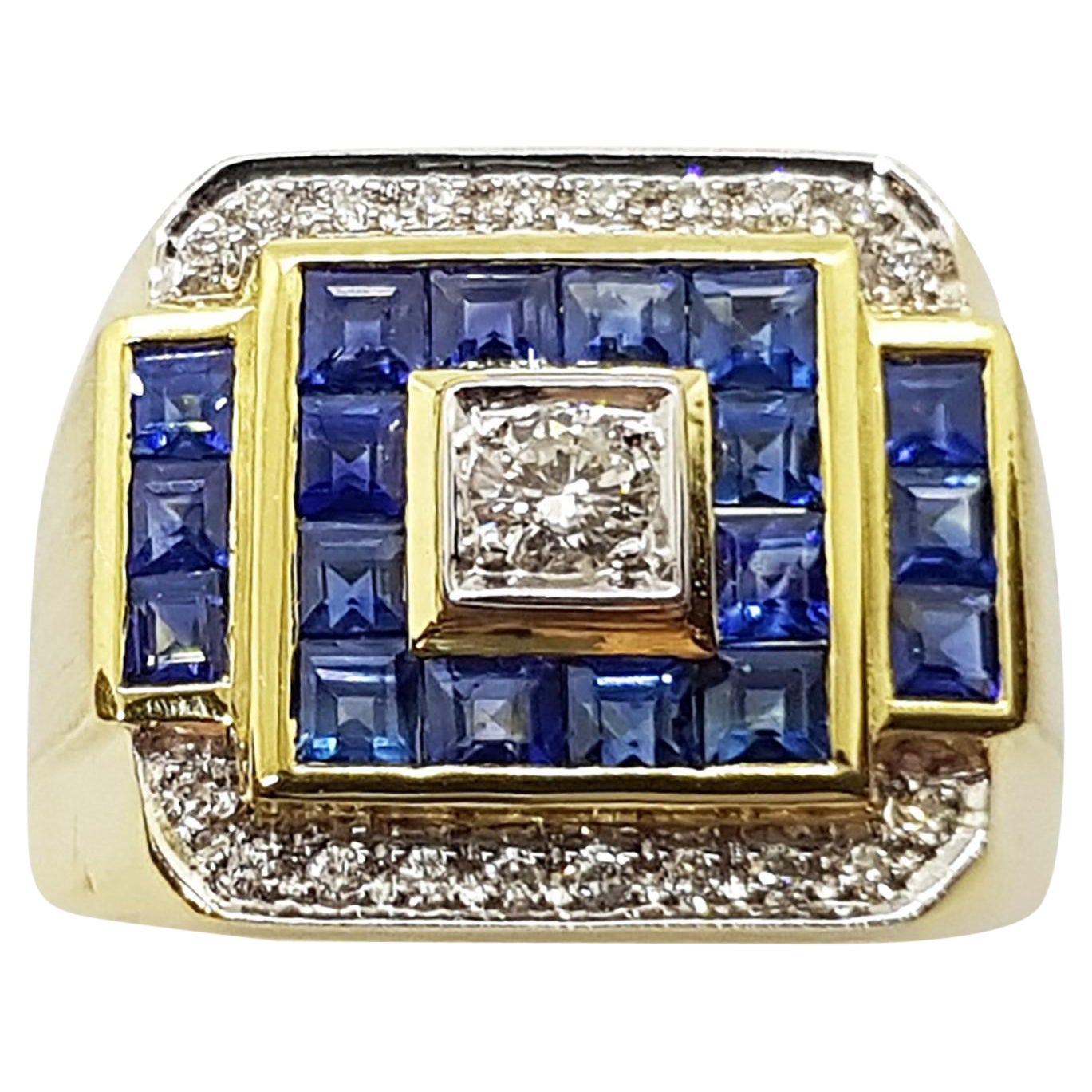 Anello con zaffiro blu e diamanti incastonati in oro 18 carati in vendita
