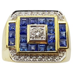 Anello con zaffiro blu e diamanti incastonati in oro 18 carati