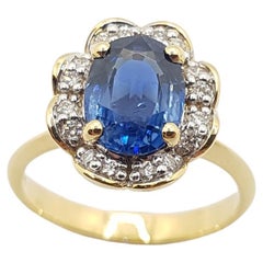 Blue Sapphire with Diamond Ring Set in 18 Karat Gold Settings
