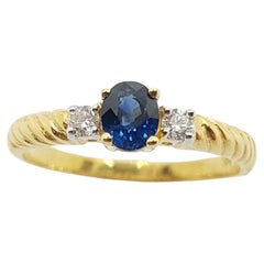 Bague en or 18 carats avec saphir bleu et diamant