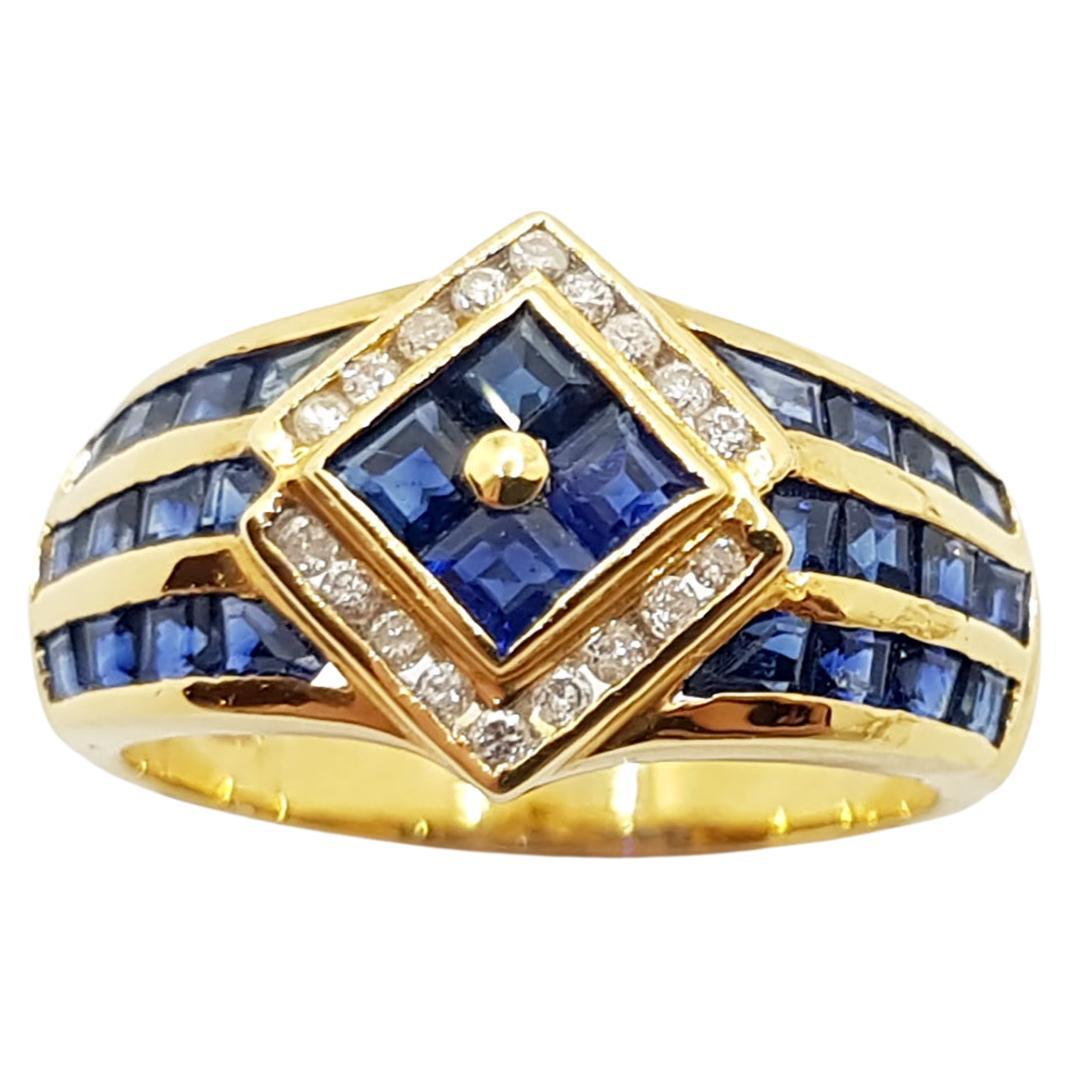 Anello con zaffiro blu e diamanti incastonati in oro 18 carati in vendita