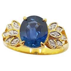 Blue Sapphire with Diamond Ring Set in 18 Karat Gold Settings