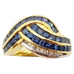 Blue Sapphire with Diamond Ring Set in 18 Karat Gold Settings