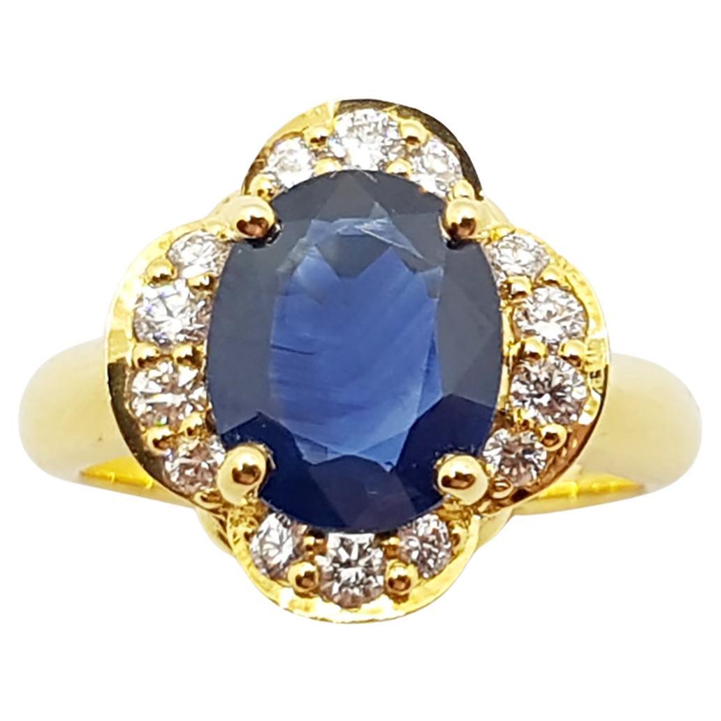 Bague en saphir bleu et diamants sertis en or 18 carats en vente