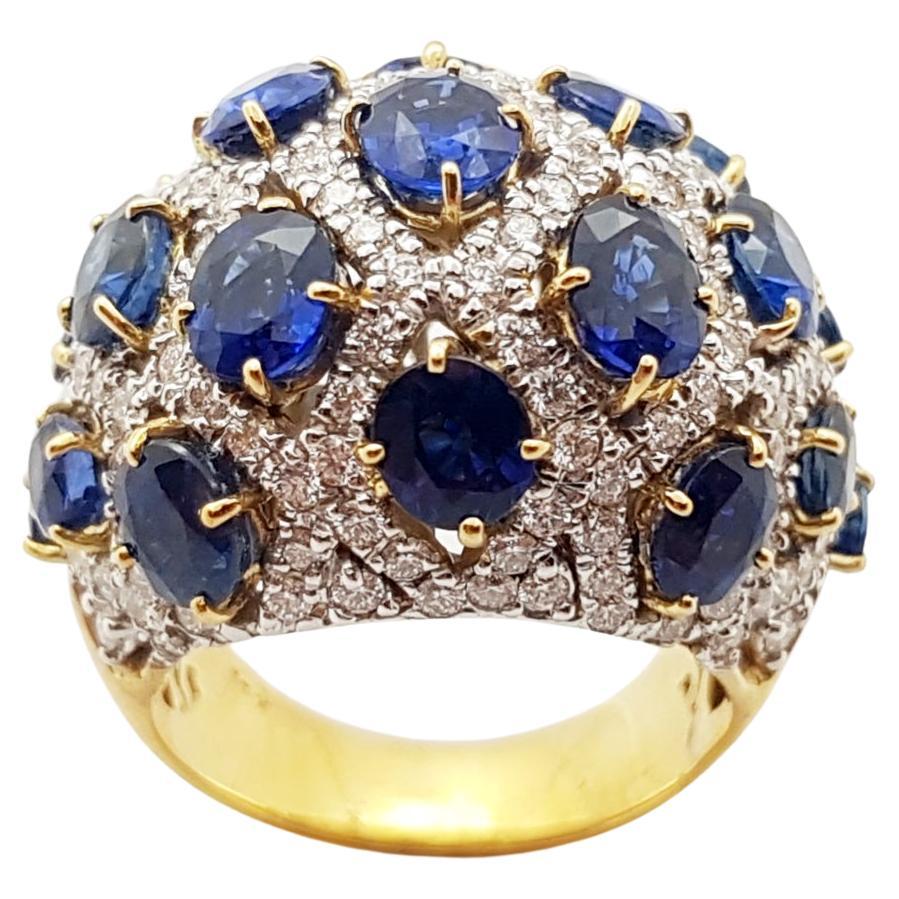 Anello con zaffiro blu e diamanti incastonati in oro 18 carati
