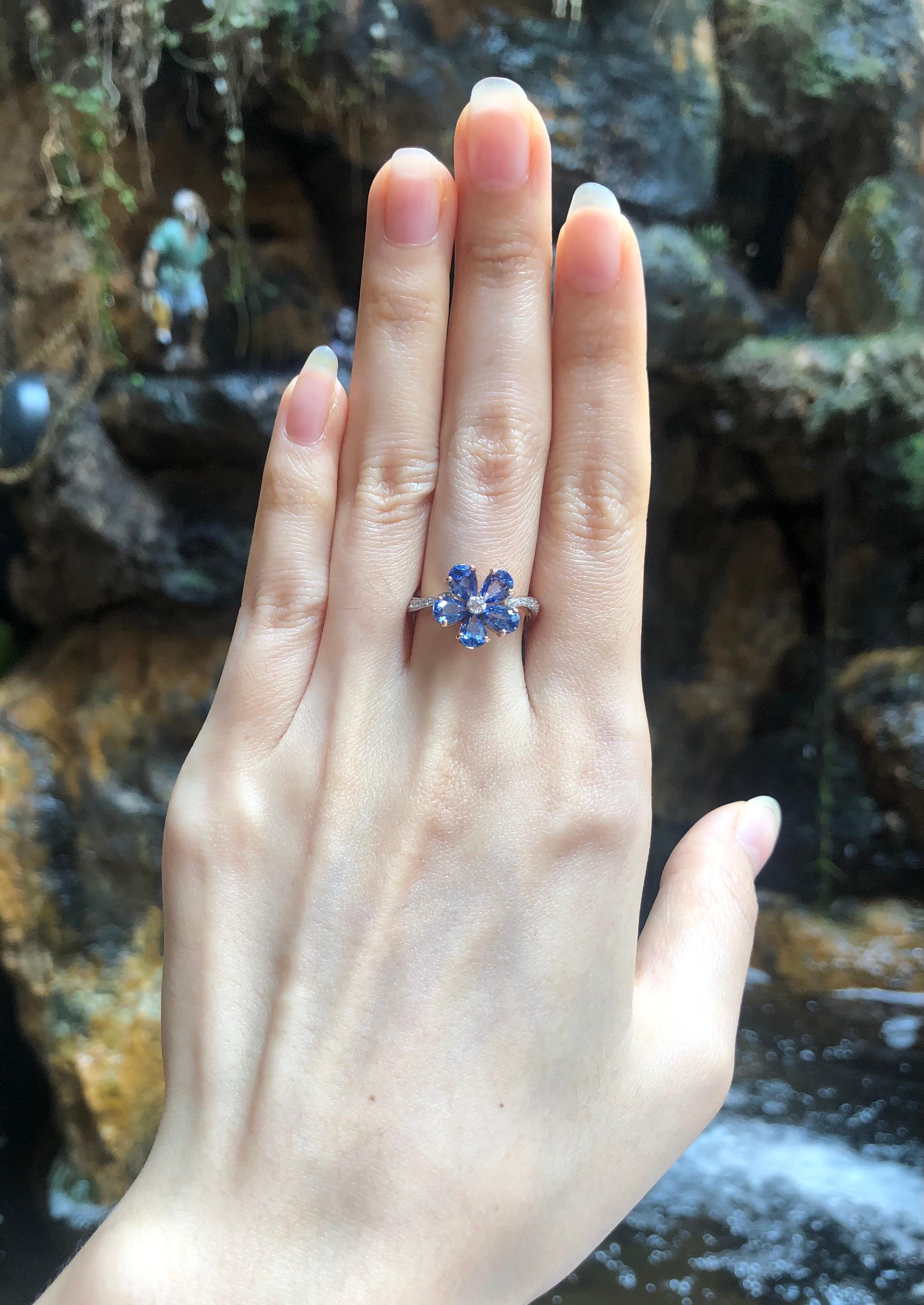 Blue Sapphire 2.63 carats with Diamond 0.14 carat Ring set in 18 Karat Rose Gold Settings

Width:  1.3 cm 
Length: 1.2 cm
Ring Size: 52
Total Weight: 5.16 grams


