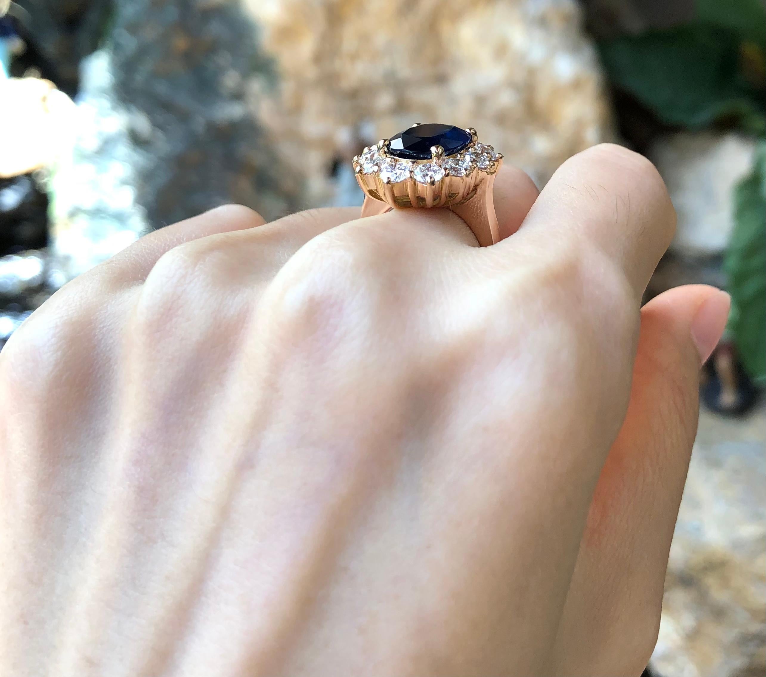 Blue Sapphire 5.19 carats with Diamond 2.28 carats Ring set in 18 Karat Rose Gold Settings

Width:  1.8 cm 
Length:  2.1 cm
Ring Size: 53
Total Weight: 12.24 grams

Blue Sapphire
Width:  0.9 cm 
Length:  1.3 cm


