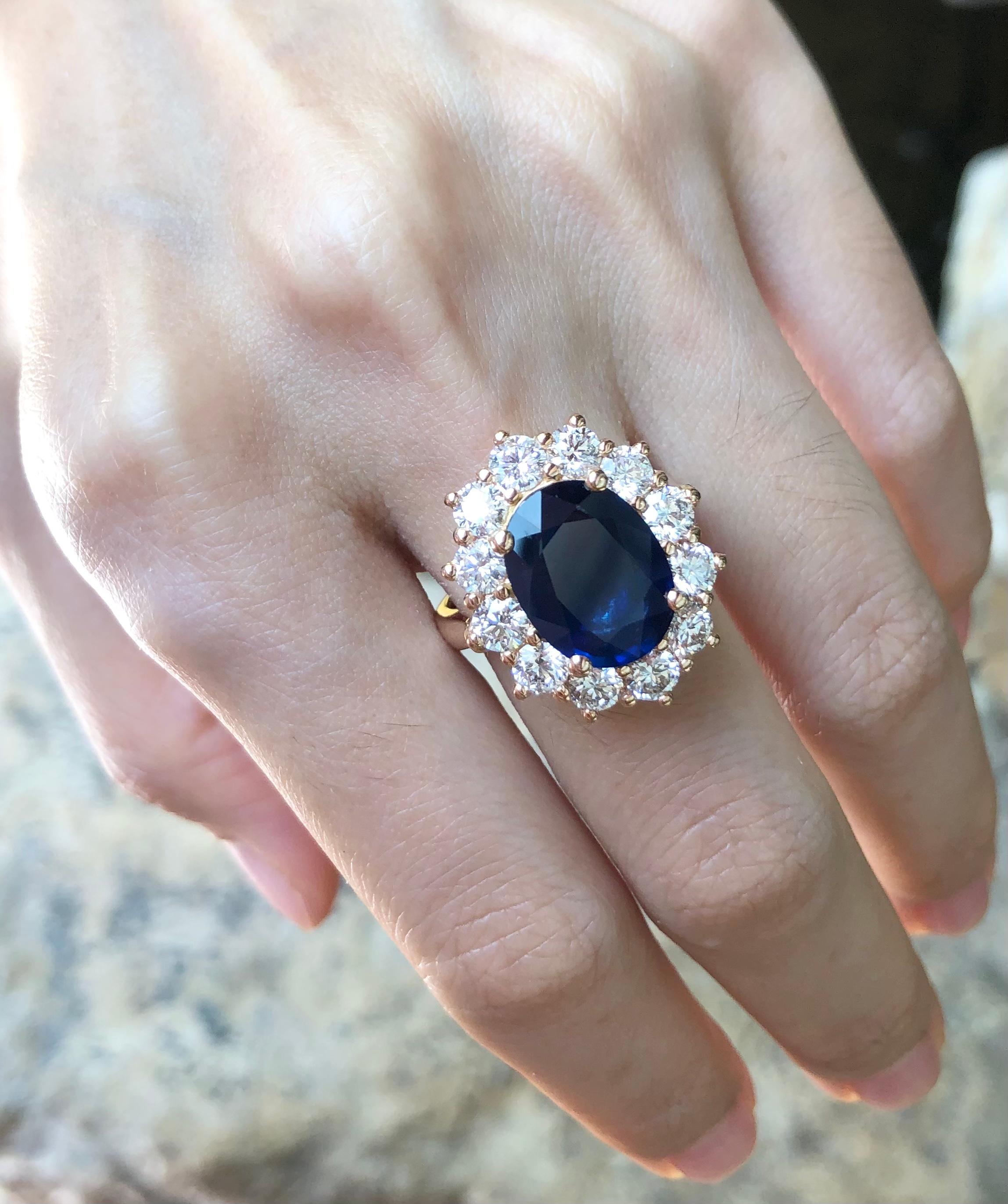 Contemporary Blue Sapphire with Diamond Ring set in 18 Karat Rose Gold Settings For Sale