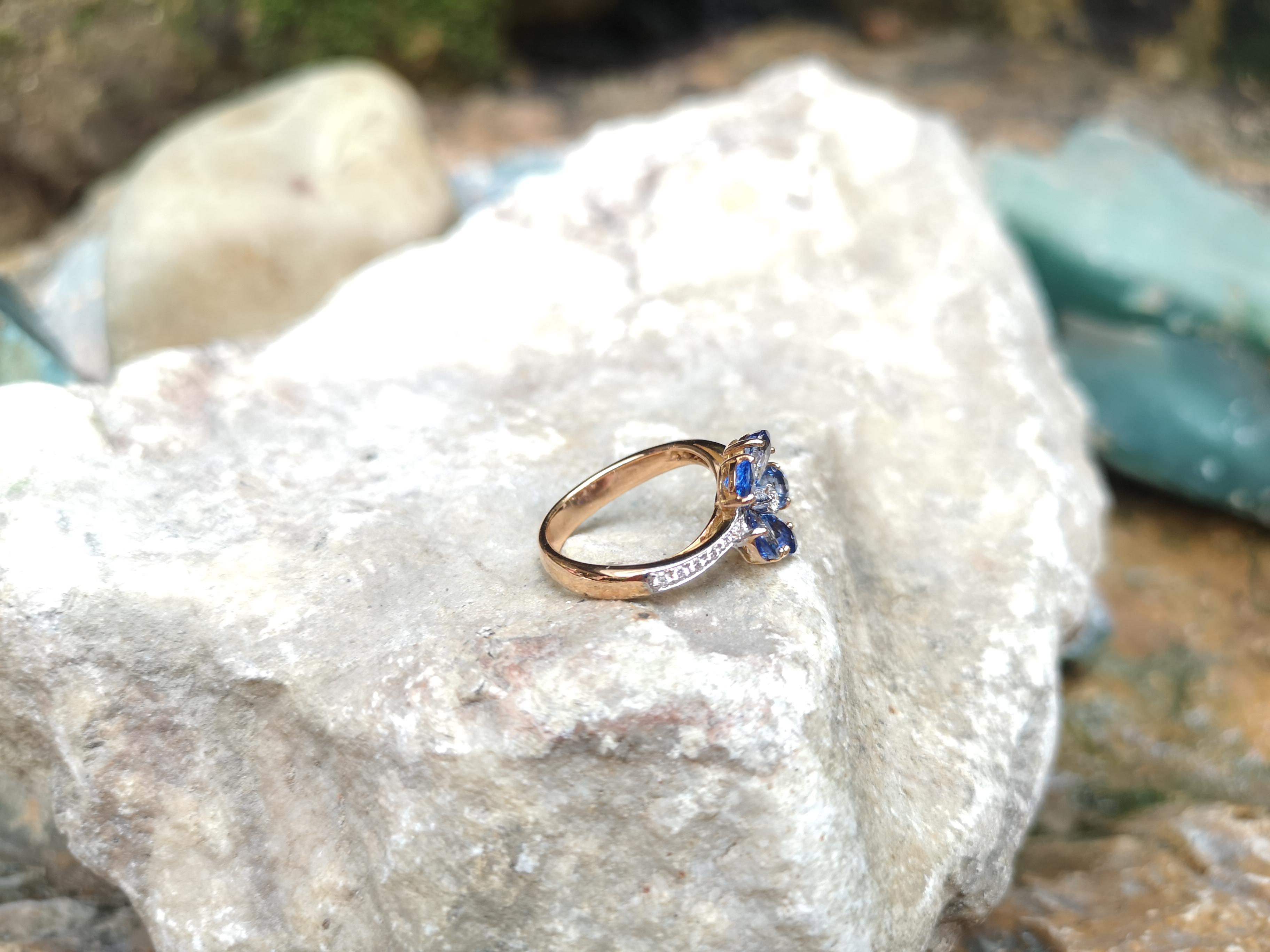 Pear Cut Blue Sapphire with Diamond Ring Set in 18 Karat Rose Gold Settings For Sale