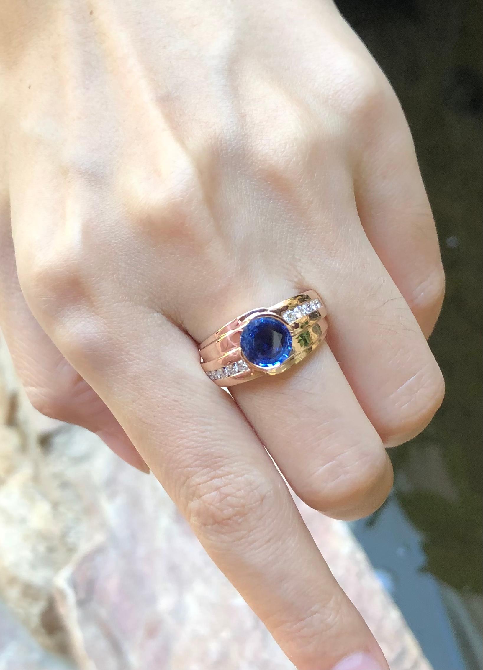 Contemporary Blue Sapphire with Diamond Ring Set in 18 Karat Rose Gold Settings For Sale