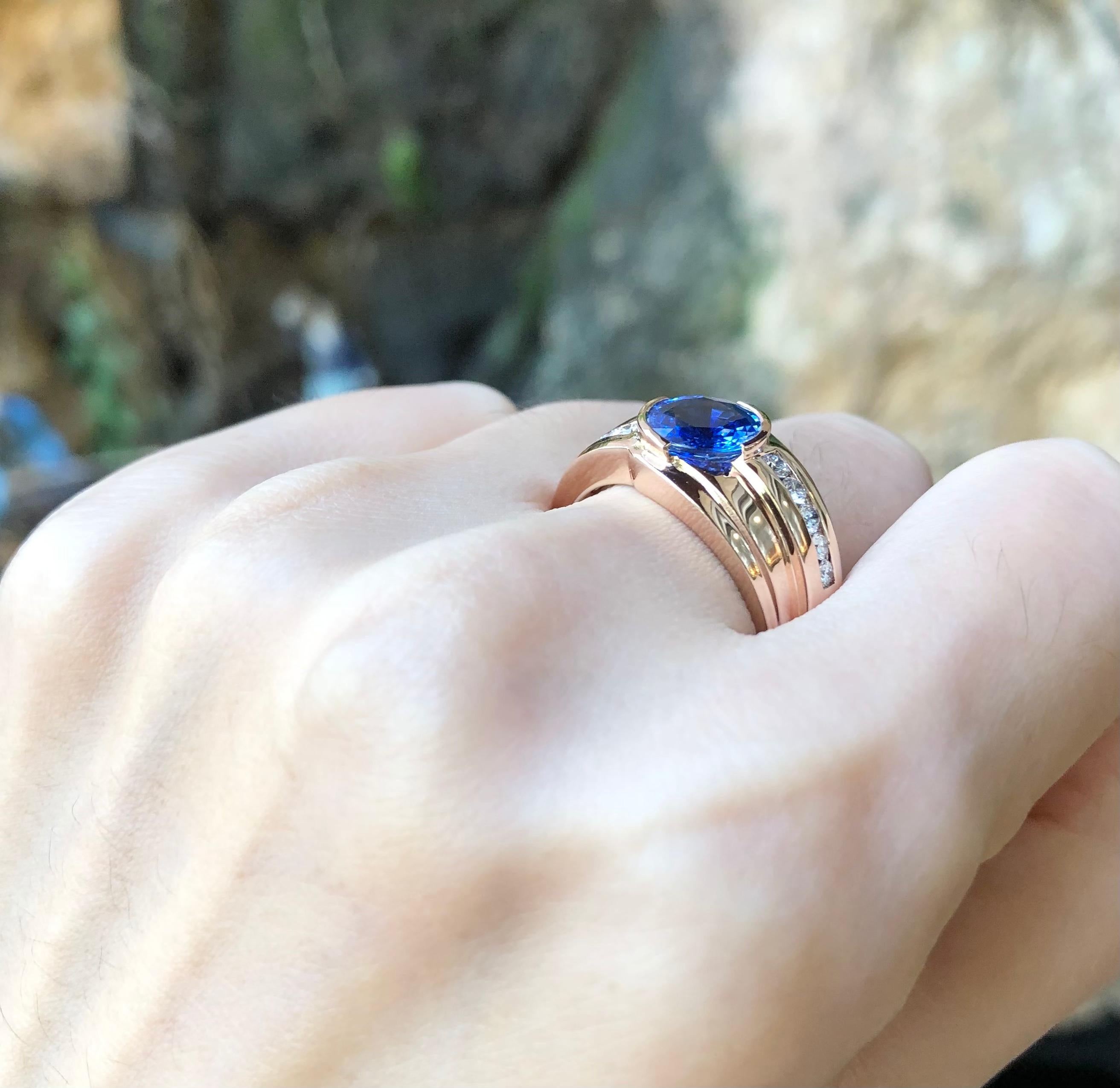 Round Cut Blue Sapphire with Diamond Ring Set in 18 Karat Rose Gold Settings For Sale