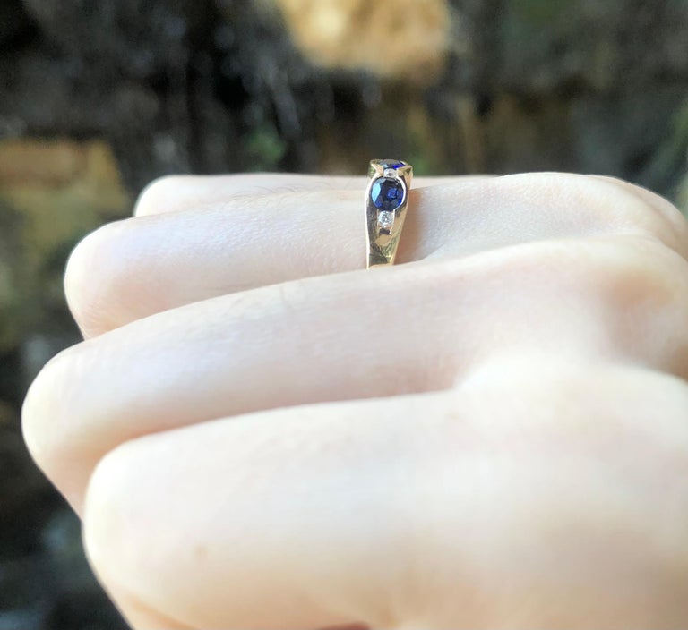 18ct Rose Gold Seven Stone Diamond And Blue Sapphire Ring