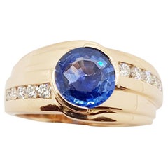Blue Sapphire with Diamond Ring Set in 18 Karat Rose Gold Settings