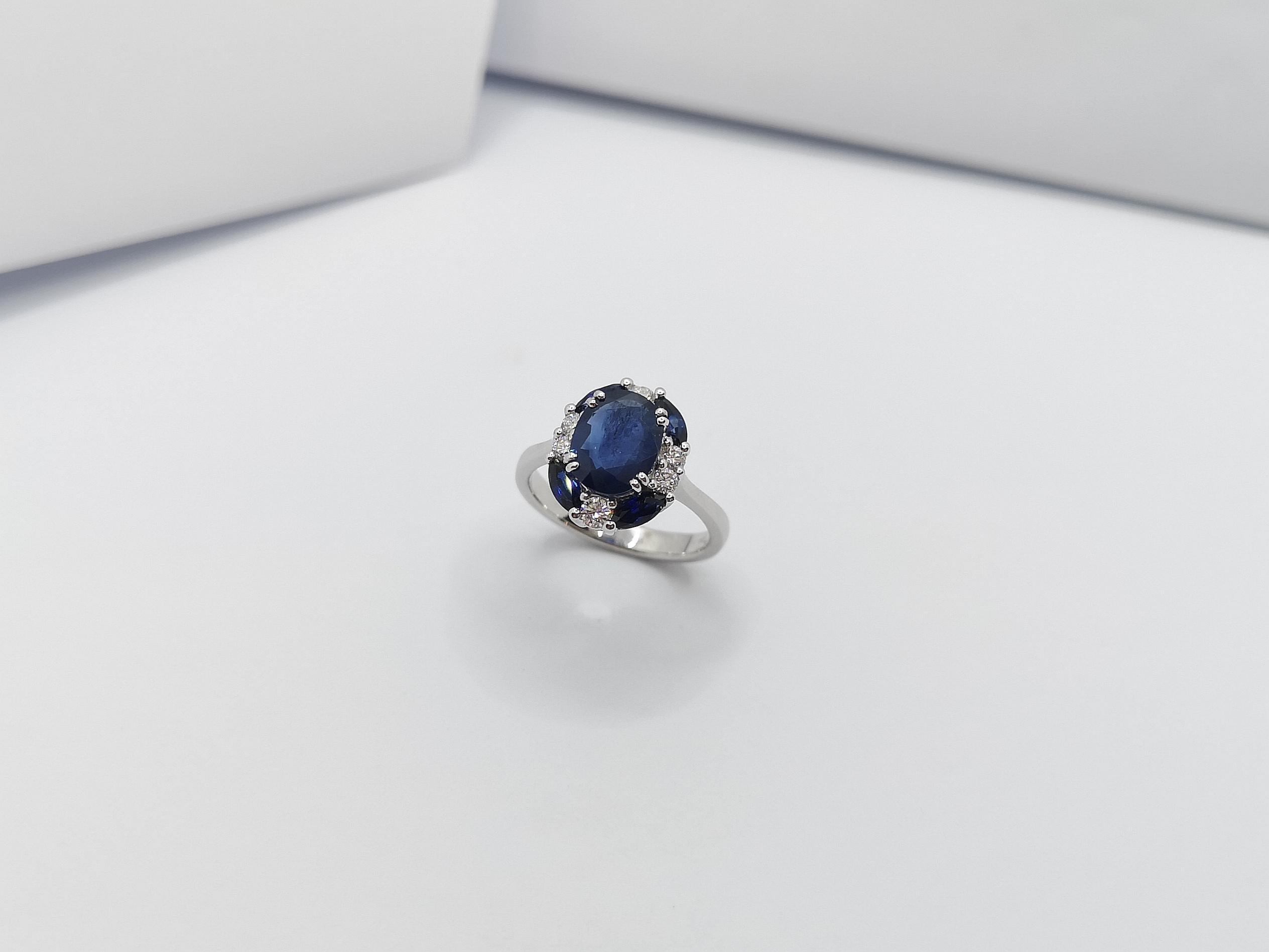 Blue Sapphire with Diamond Ring Set in 18 Karat White Gold Settings For Sale 6