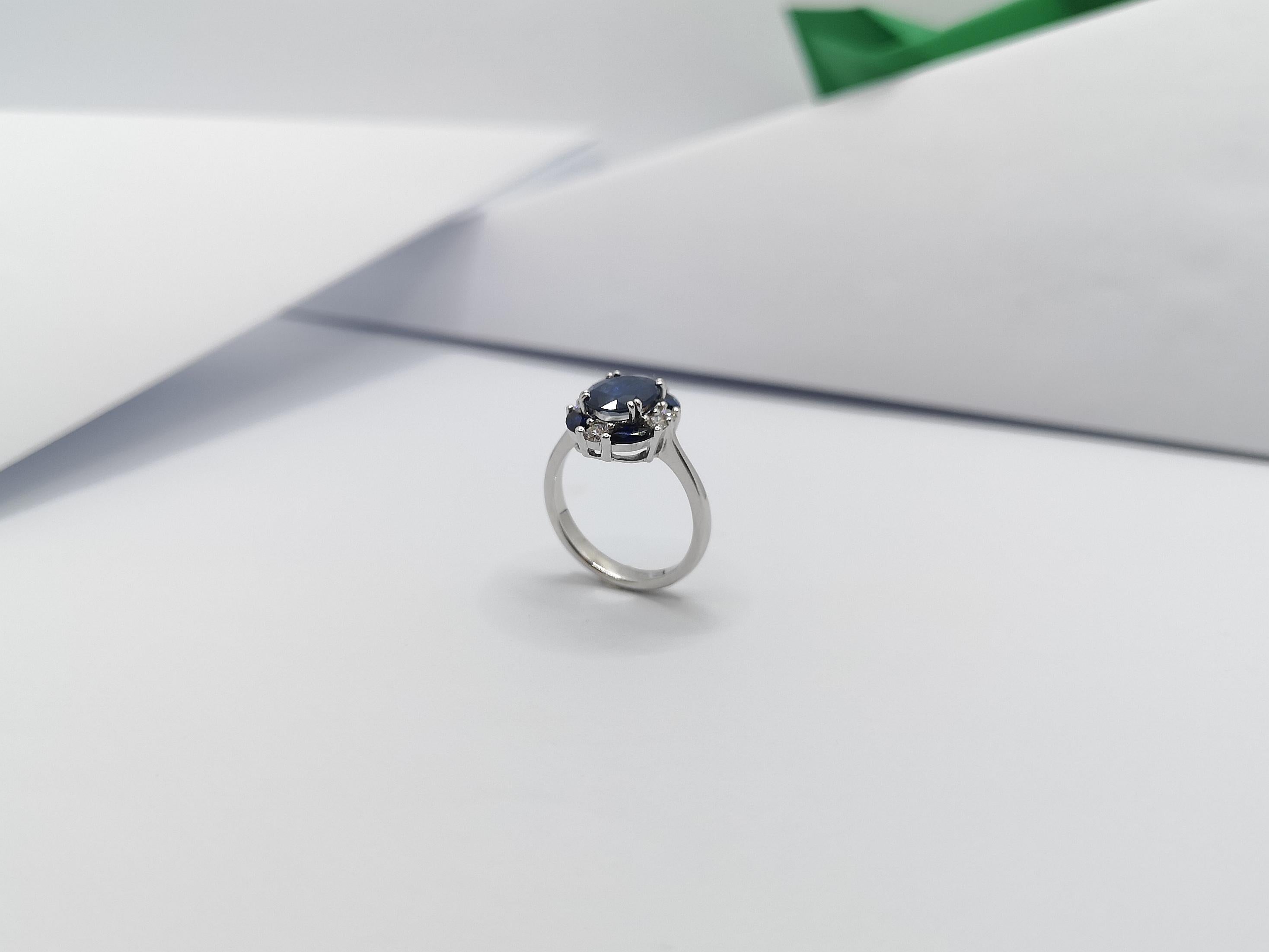 Blue Sapphire with Diamond Ring Set in 18 Karat White Gold Settings For Sale 9