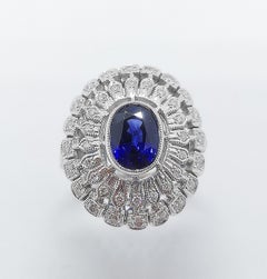 Blue Sapphire with Diamond Ring Set in 18 Karat White Gold Settings