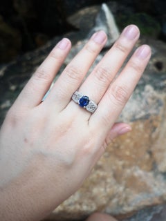 Blue Sapphire with Diamond Ring Set in 18 Karat White Gold Settings