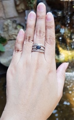 Blue Sapphire with Diamond Ring Set in 18 Karat White Gold Settings
