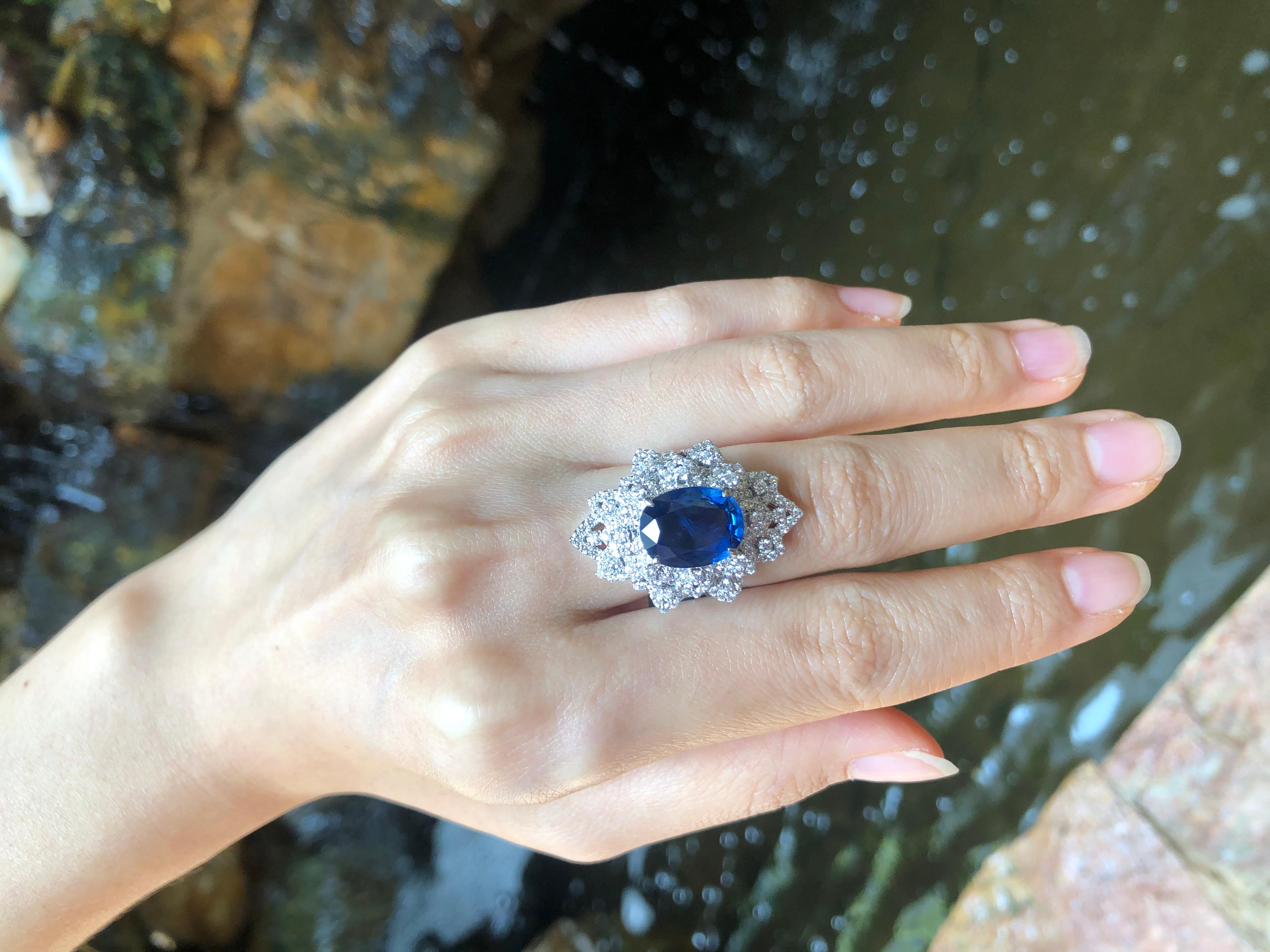 Blue Sapphire 5.23 carats with Diamond 1.86 carats Ring set in 18 Karat White Gold Settings

Width:  2.0 cm 
Length: 3.0 cm
Ring Size: 50
Total Weight: 12.13 grams

