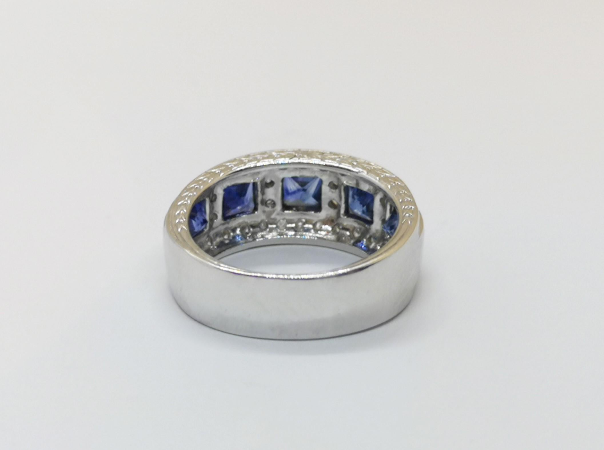 Blue Sapphire 2.12 carats with Diamond 0.37 carat Ring set in 18 Karat White Gold Settings

Width: 2.0 cm
Length: 0.9 cm 
Ring Size: 54

