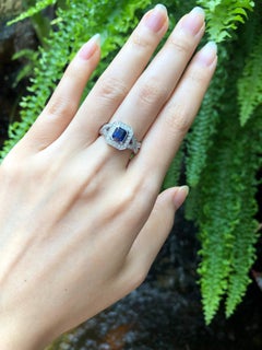 Blue Sapphire with Diamond Ring Set in 18 Karat White Gold Settings