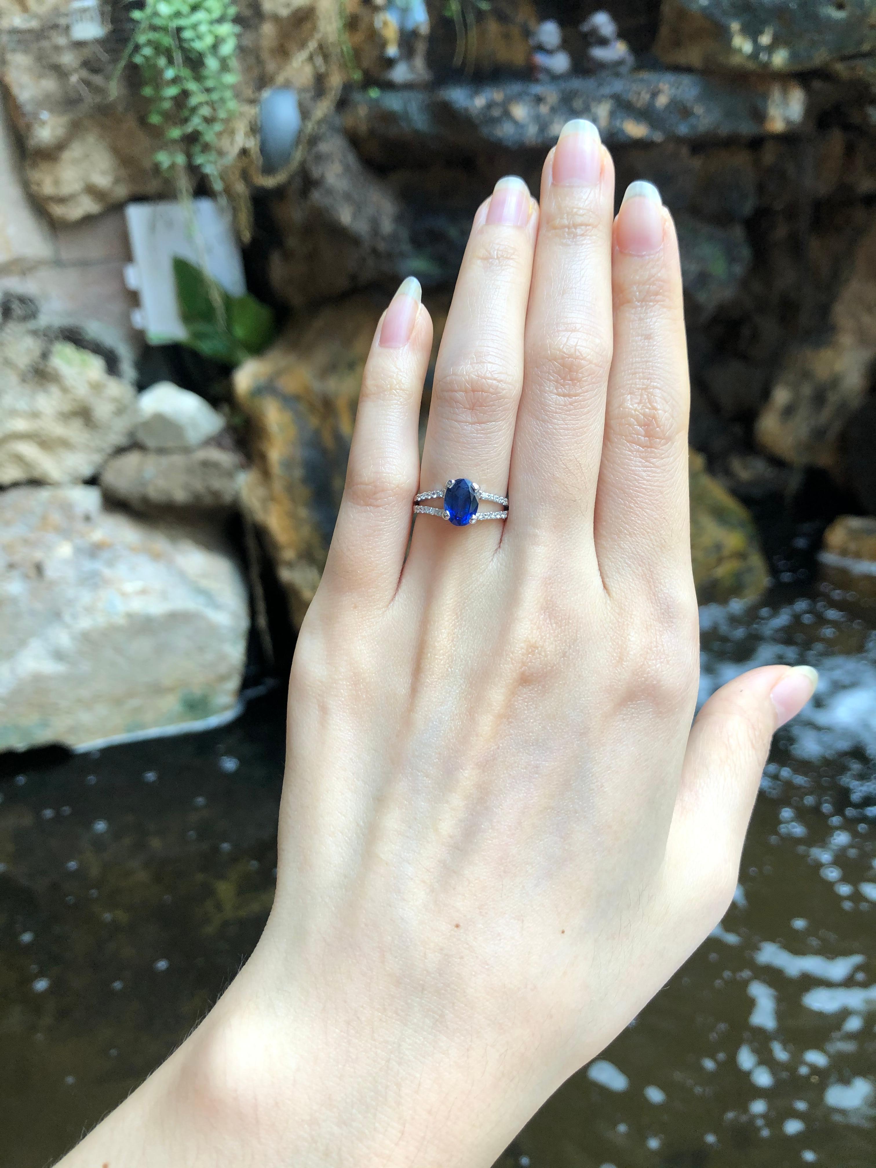 Blue Sapphire 1.62 carats with Diamond 0.14 carat Ring set in 18 Karat White Gold Settings

Width:  0.6 cm 
Length: 0.8 cm
Ring Size: 48
Total Weight: 3.0 grams

