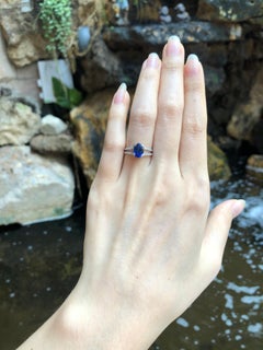 Blue Sapphire with Diamond Ring Set in 18 Karat White Gold Settings