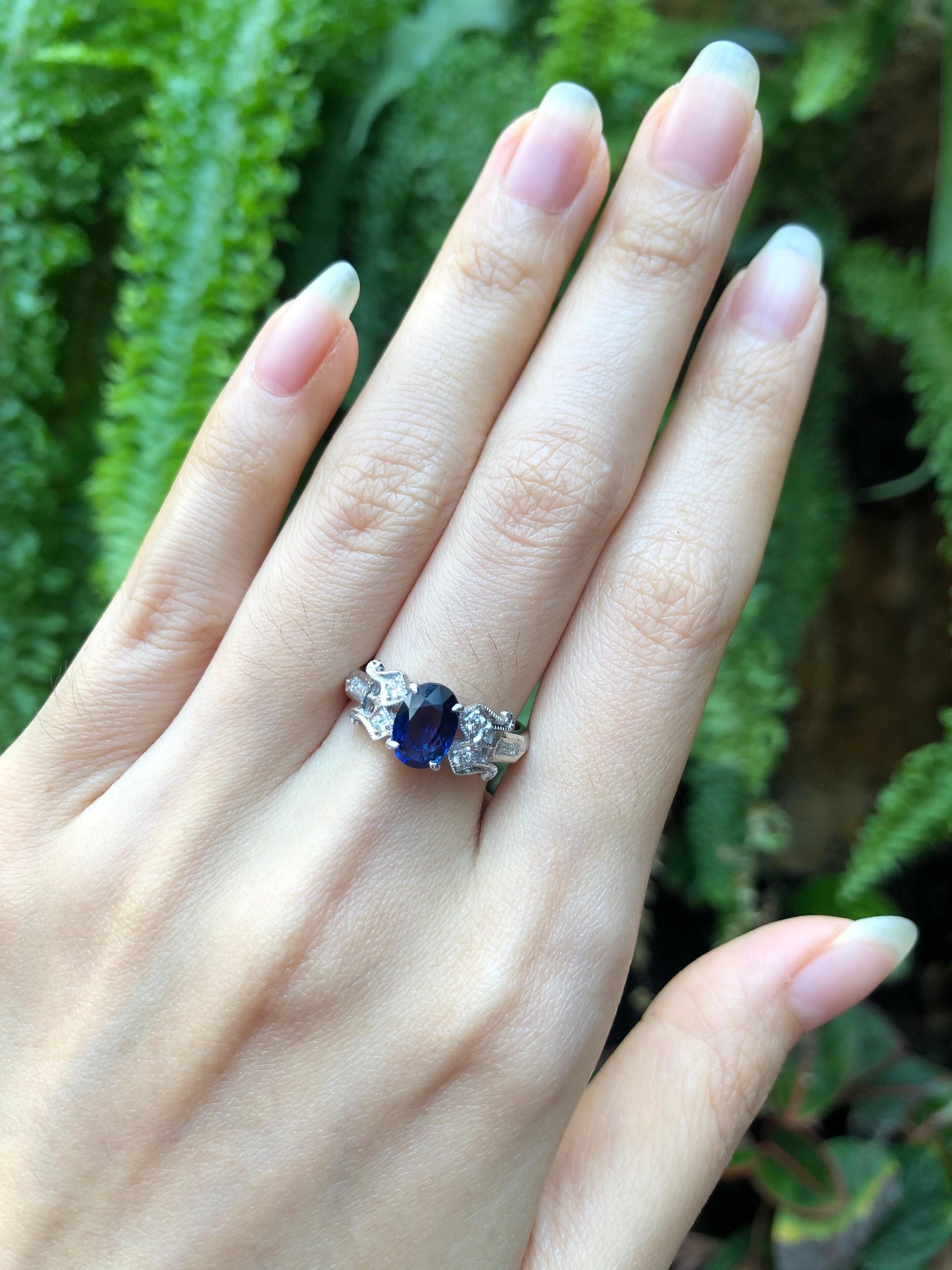 Blue Sapphire 2.01 carats with Diamond 0.18 carat Ring set in 18 Karat White Gold Settings

Width:  0.6 cm 
Length: 0.8 cm
Ring Size: 53
Total Weight: 4.32 grams

