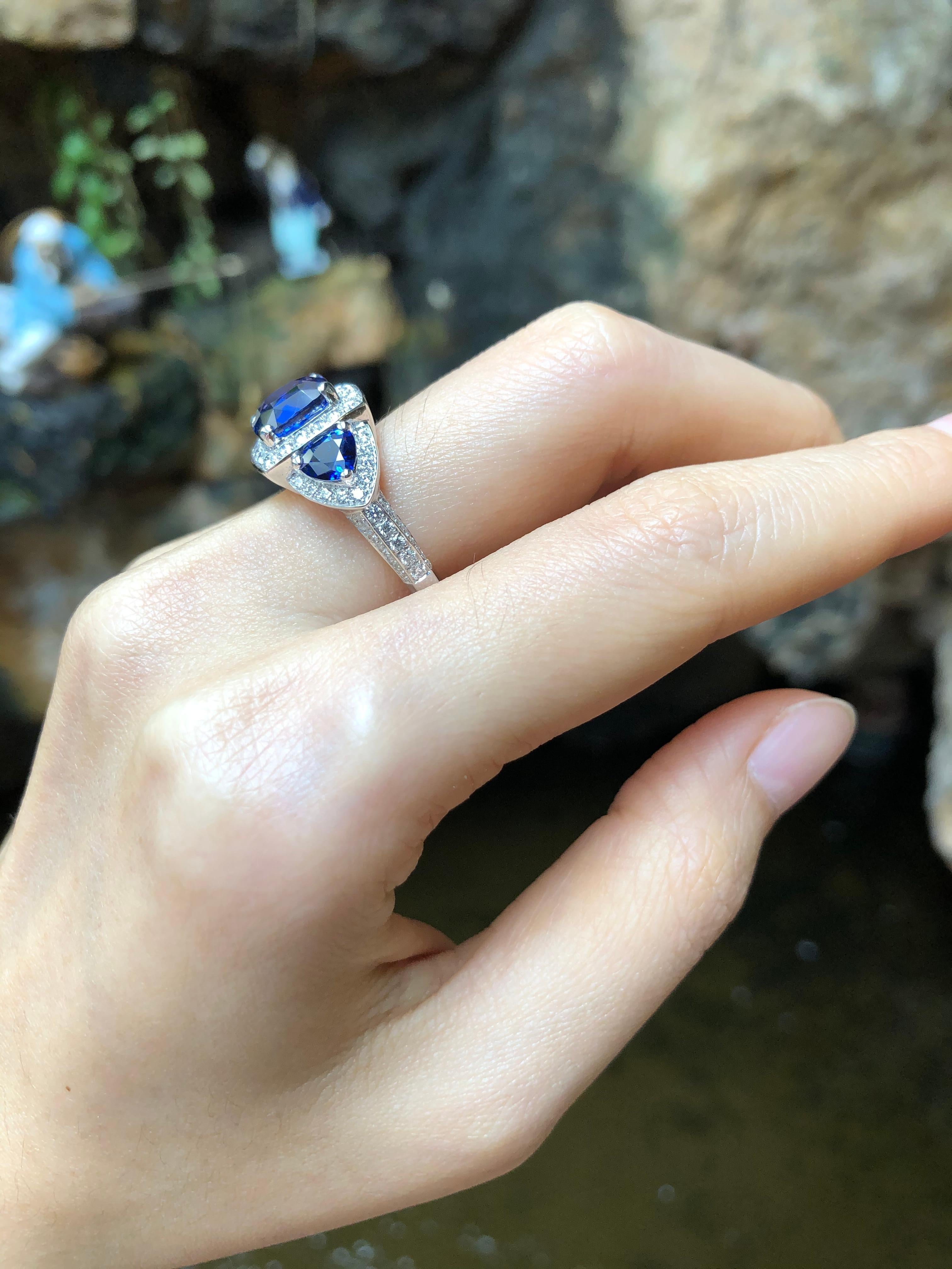 Blue Sapphire 3.64 carats with Blue Sapphire 1.40 carats and Diamond 0.96 carat Ring set in 18 Karat White Gold Settings

Width:  0.8 cm 
Length: 0.8 cm
Ring Size: 54
Total Weight: 6.91 grams

