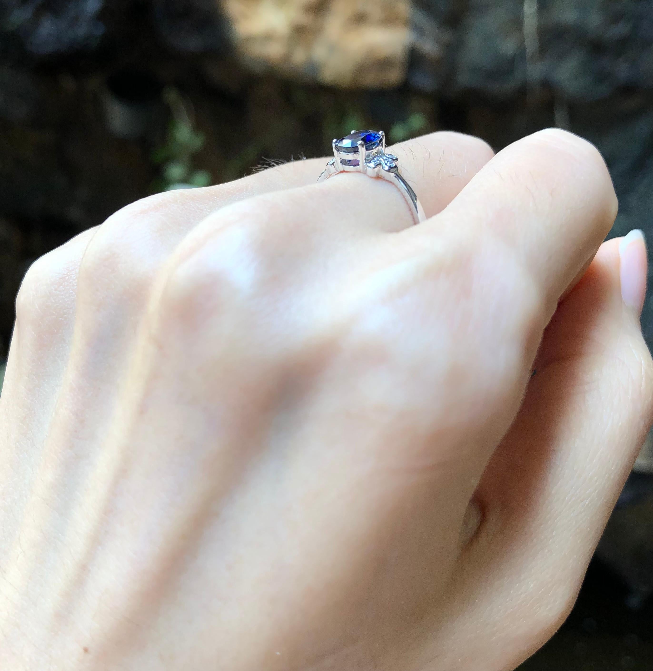 Blue Sapphire 0.82 carat with Diamond 0.03 carat Ring set in 18 Karat White Gold Settings

Width:  0.5 cm 
Length: 0.7 cm
Ring Size: 54
Total Weight: 2.3 grams

