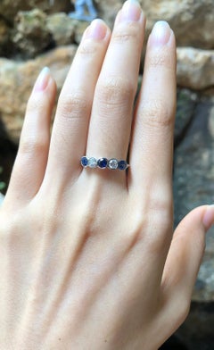 Blue Sapphire with Diamond Ring Set in 18 Karat White Gold Settings