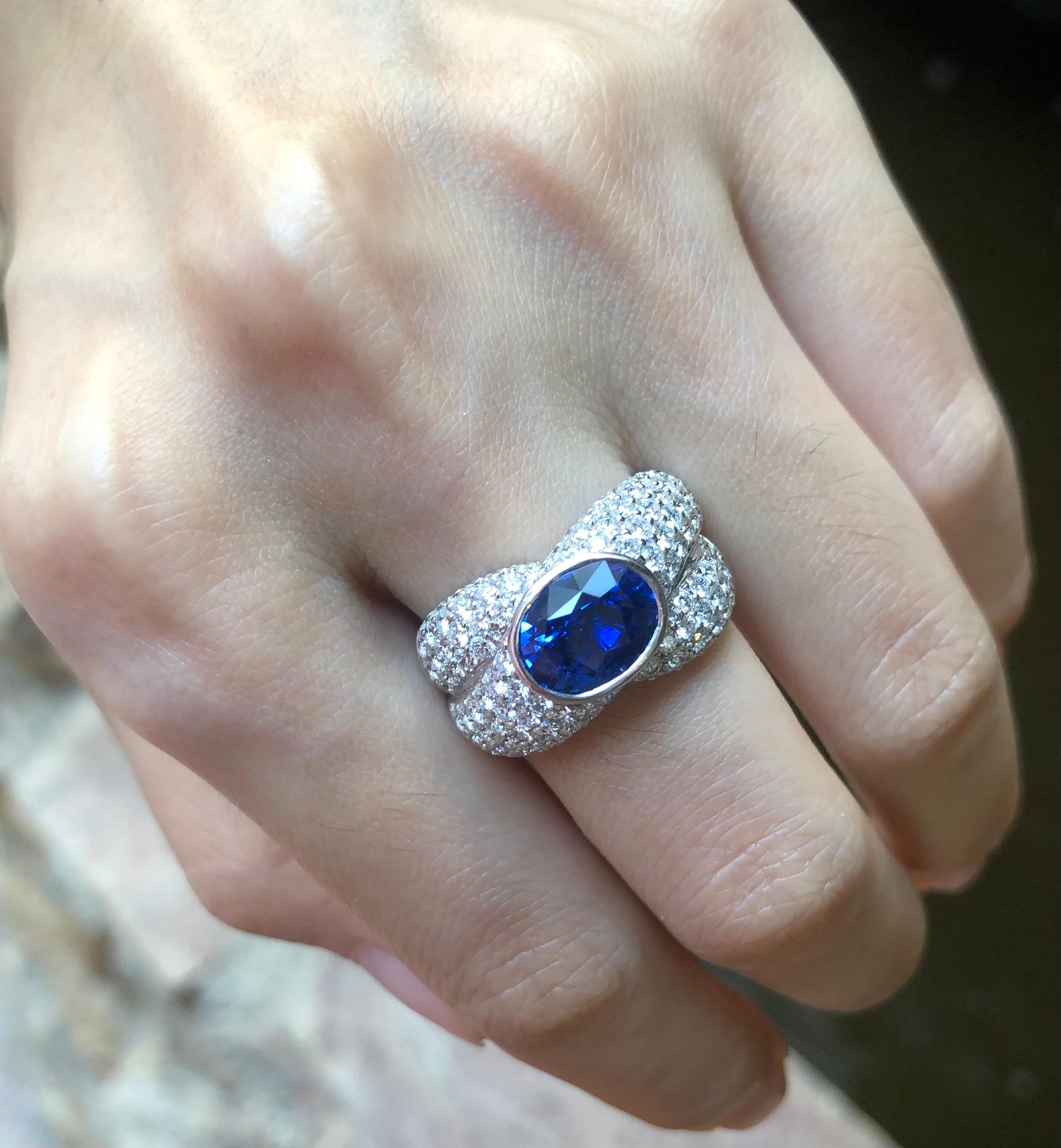 Blue Sapphire 3.5 carats with Diamond 1.97 carats Ring set in 18 Karat White Gold Settings                                                                                                                                                               