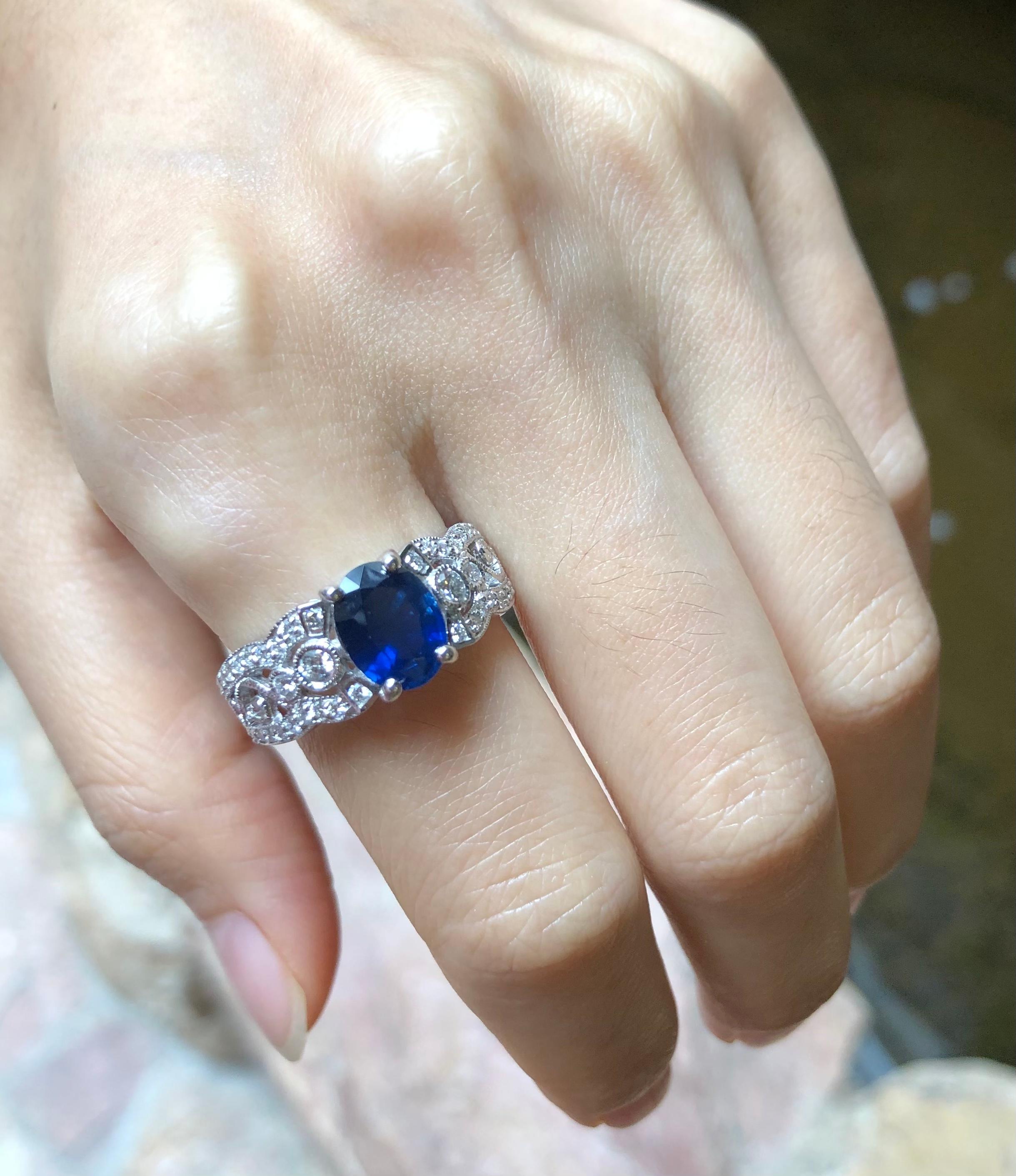 Blue Sapphire 1.82 carats with Diamond 0.49 carat Ring set in 18 Karat White Gold Settings

Width:  0.6 cm 
Length:  0.9 cm
Ring Size: 56
Total Weight: 6.37 grams

