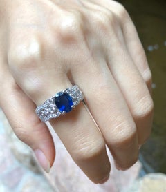 Blue Sapphire with Diamond Ring Set in 18 Karat White Gold Settings