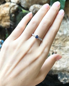 Blue Sapphire with Diamond Ring Set in 18 Karat White Gold Settings
