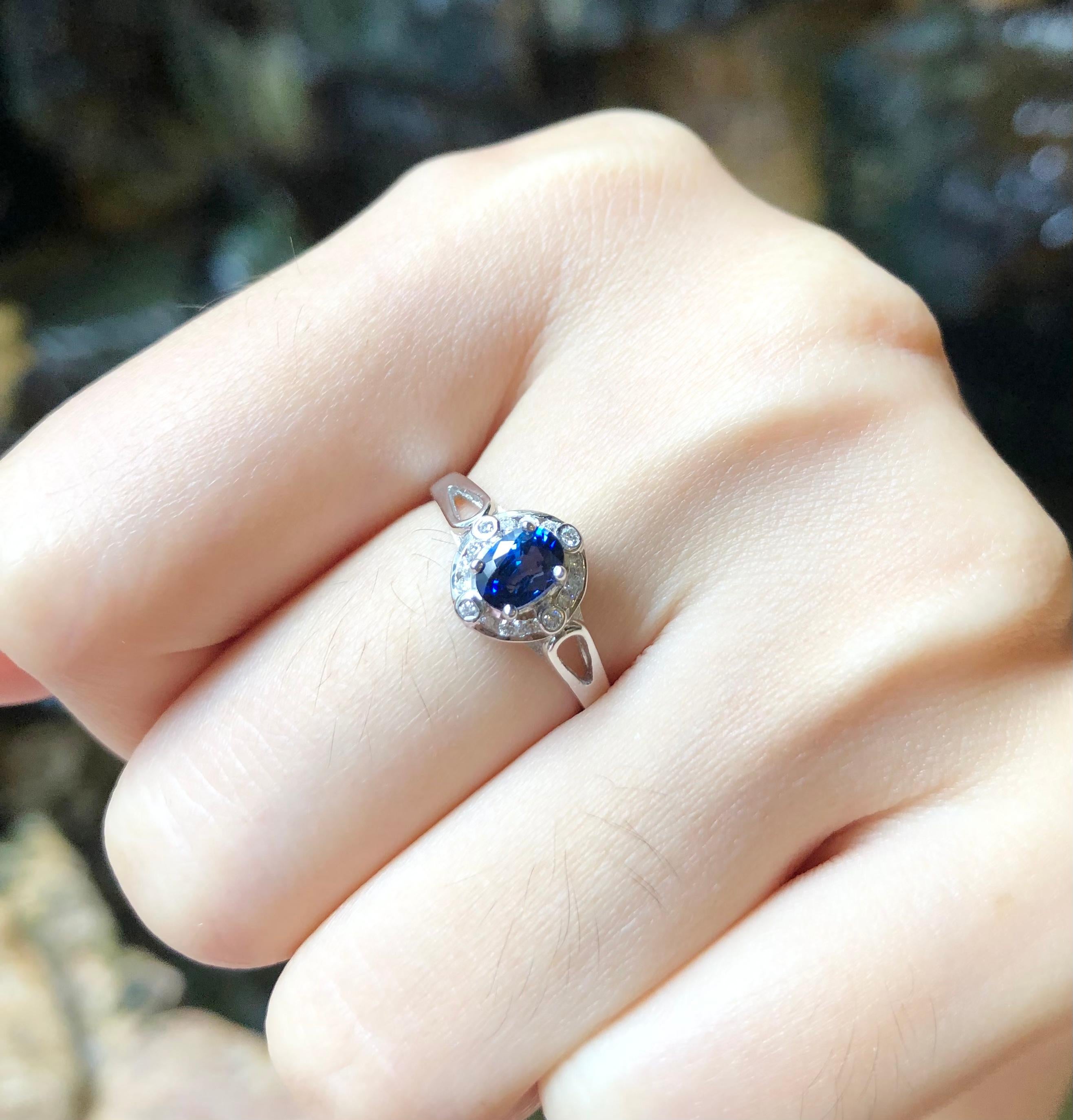 Blue Sapphire 0.60 carat with Diamond 0.11 carat Ring set in 18 Karat White Gold Settings

Width:  0.7 cm 
Length: 0.8 cm
Ring Size: 50
Total Weight: 2.23 grams

Blue Sapphire 
Width:  0.4 cm 
Length: 0.8 cm

