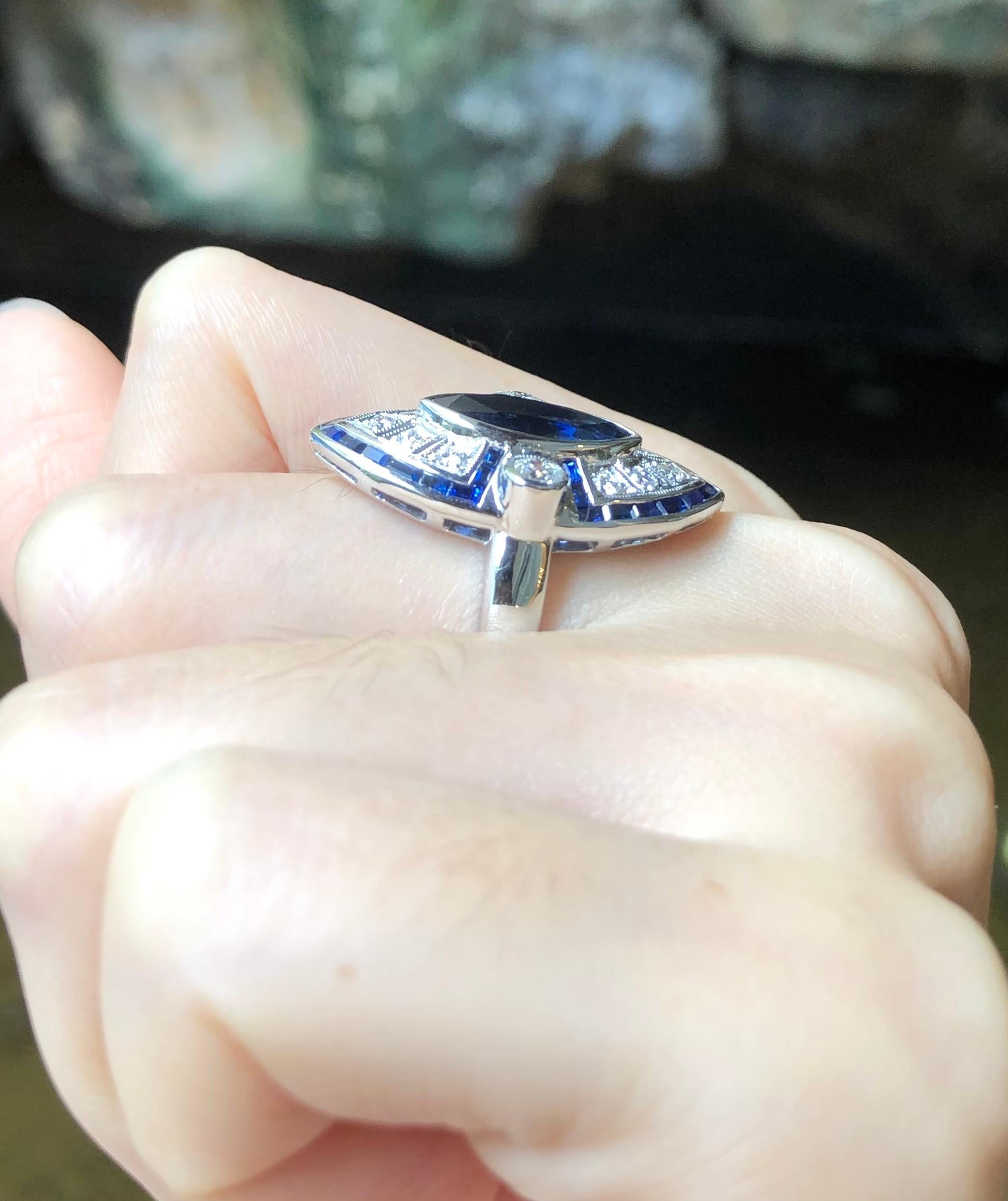 Blue Sapphire  2.62 carats with Diamond 0.49 carat and Blue Sapphire 1.30 carats Ring set in 18 Karat White Gold Settings

Width:  1.5 cm 
Length: 1.7 cm
Ring Size: 55
Total Weight: 10.72 grams

