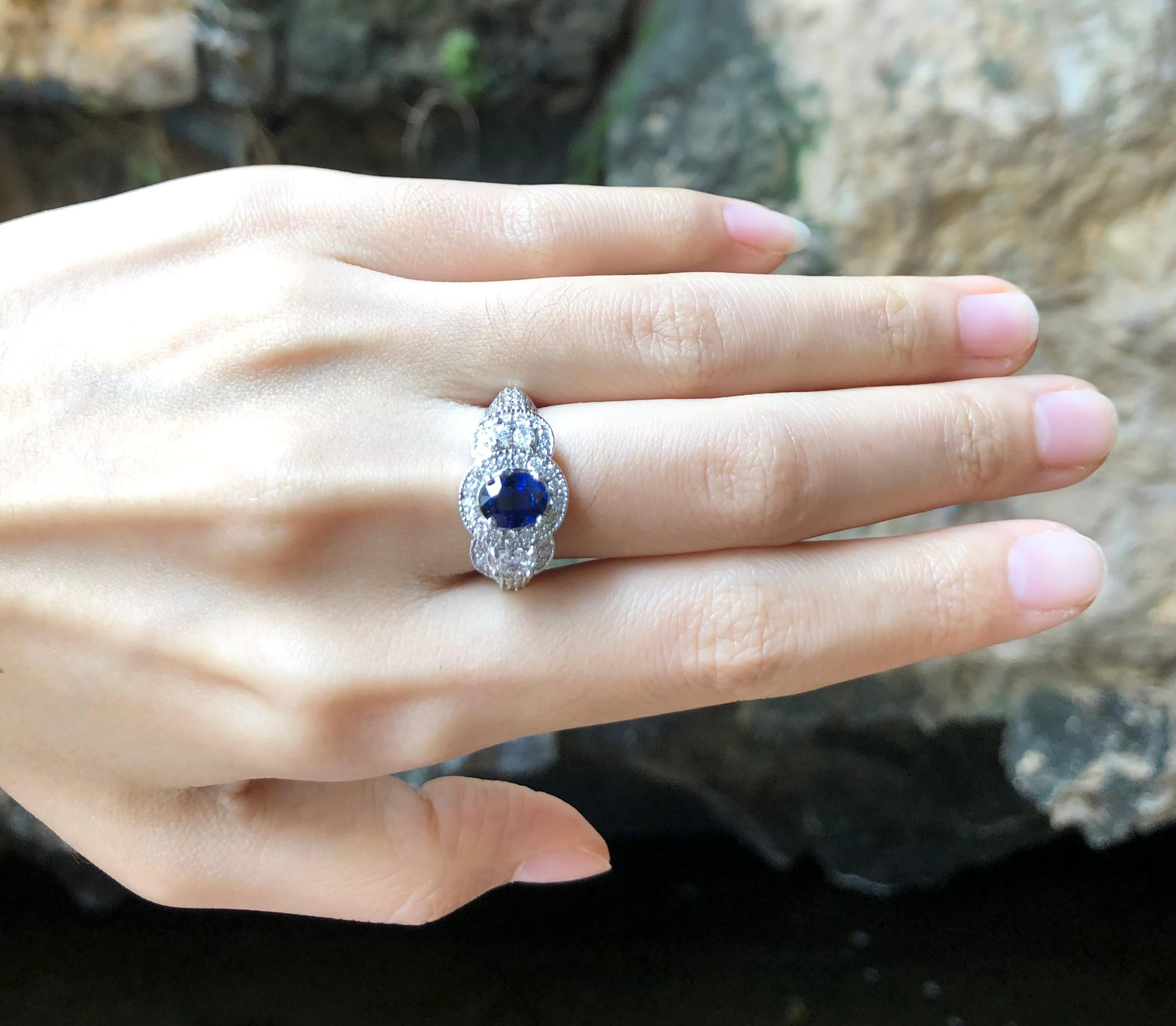 Blue Sapphire 1.27 carats with Diamond 1.01 carats Ring set in 18 Karat White Gold Settings

Width:  1.7 cm 
Length: 1.1 cm
Ring Size: 53
Total Weight: 8.16 grams

Blue Sapphire 
Width:  0.5 cm 
Length: 0.6 cm

