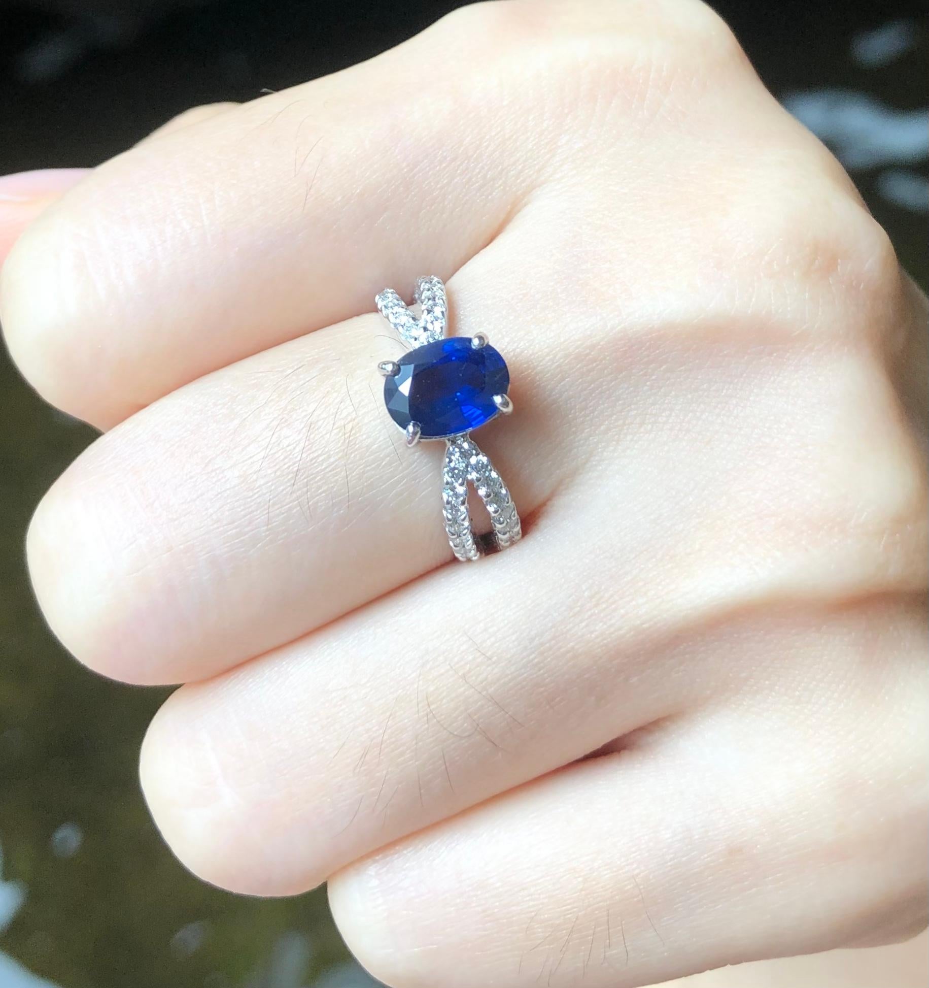 Blue Sapphire 1.60 carats with Diamond 0.52 carat Ring set in 18 Karat White Gold Settings

Width:  0.5 cm 
Length: 0.7 cm
Ring Size: 52
Total Weight: 4.81 grams

