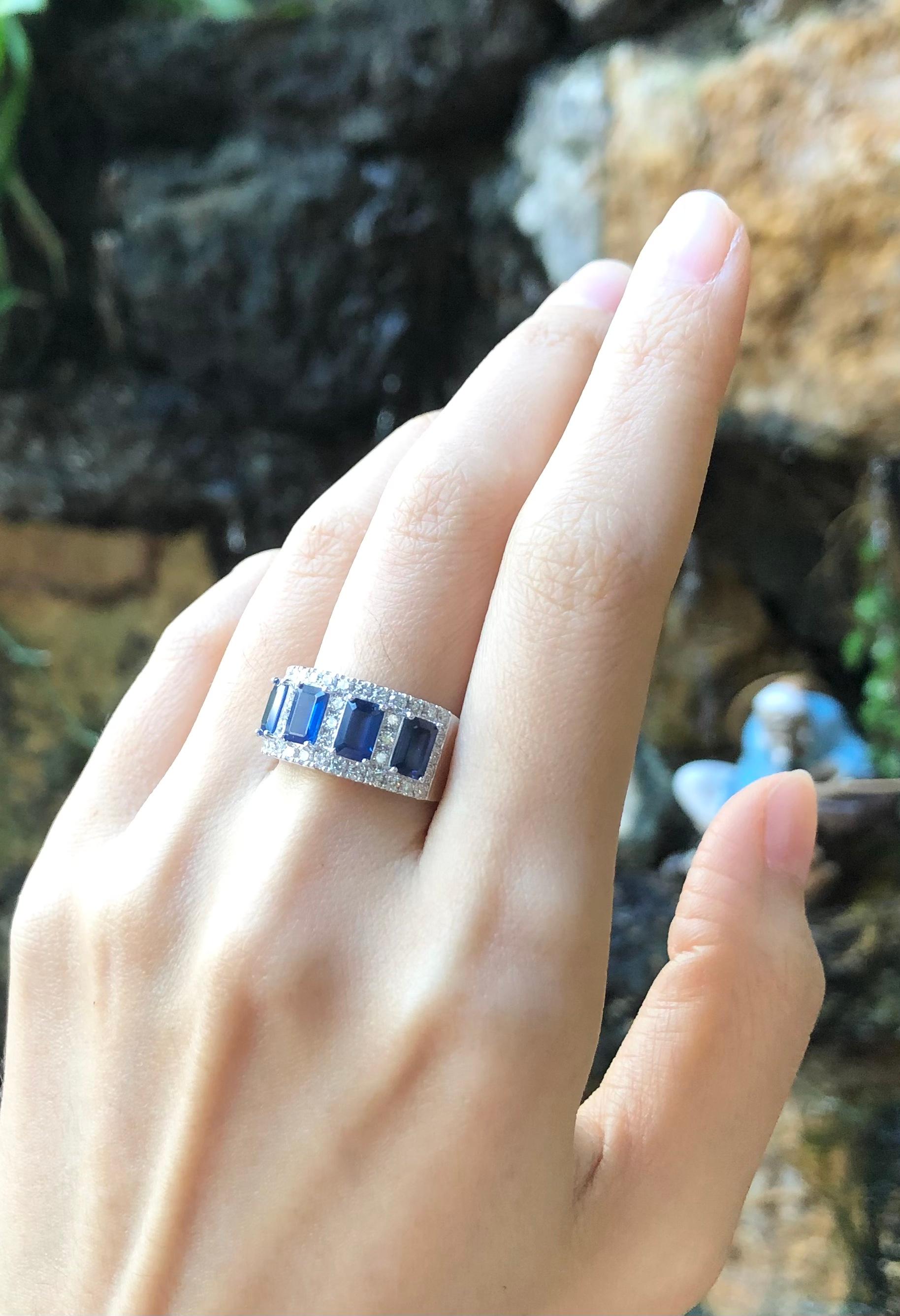 Blue Sapphire 2.22 carats with Diamond 0.84 carat Ring set in 18 Karat White Gold Settings

Width:  1.9 cm 
Length: 1.0 cm
Ring Size: 54
Total Weight: 7.05 grams

