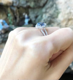 Blue Sapphire with Diamond Ring Set in 18 Karat White Gold Settings