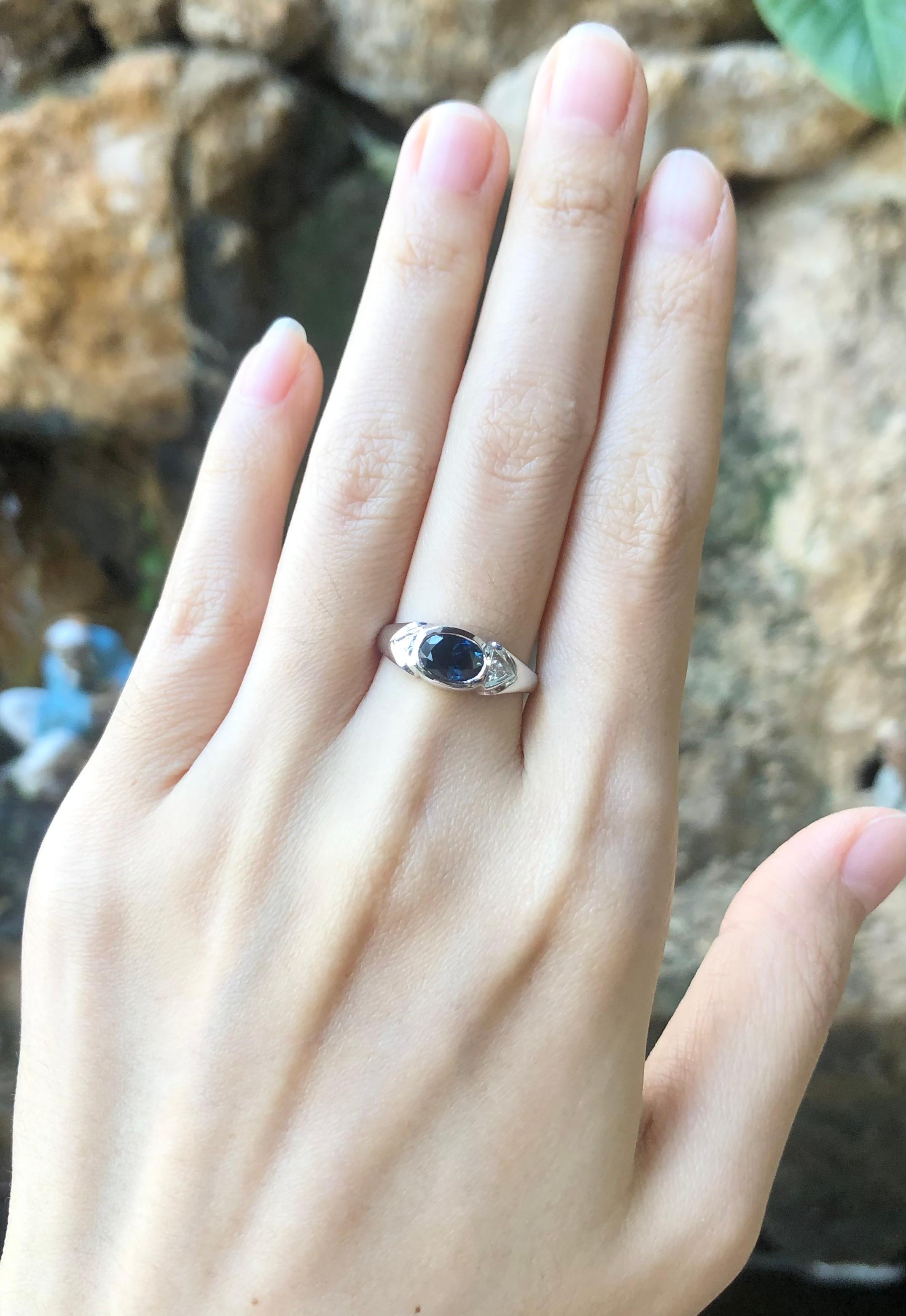 Blue Sapphire 0.86 carats with Diamond 0.04 carat Ring set in 18 Karat White Gold Settings

Width:  1.0 cm 
Length: 0.7 cm
Ring Size: 53
Total Weight: 4.30 grams

