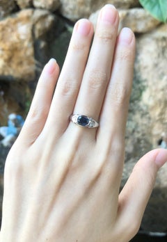 Blue Sapphire with Diamond Ring Set in 18 Karat White Gold Settings