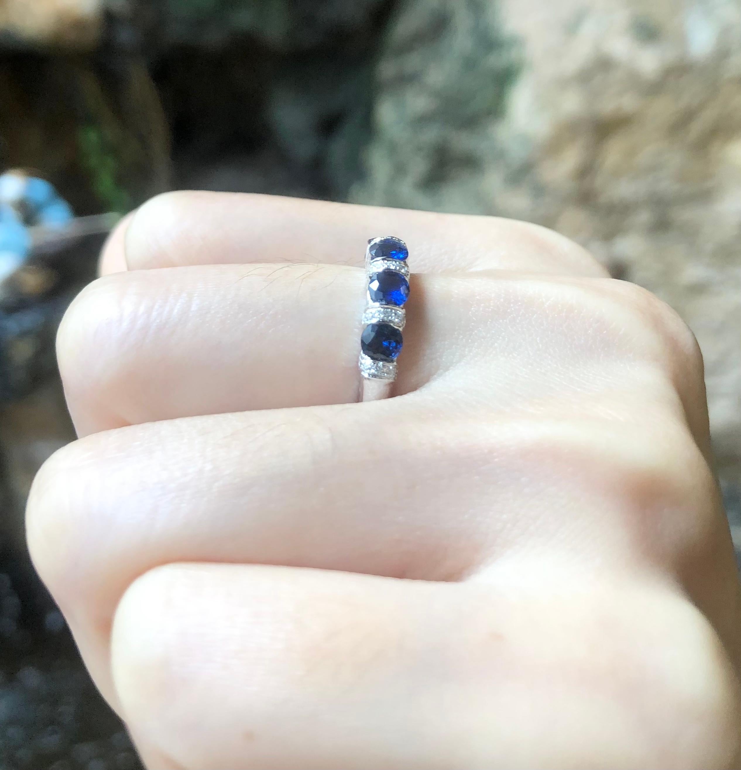 Blue Sapphire 1.13 carats with Diamond 0.11 carat Ring set in 18 Karat White Gold Settings

Width:  2.0 cm 
Length: 0.4 cm
Ring Size: 50
Total Weight: 3.58 grams


