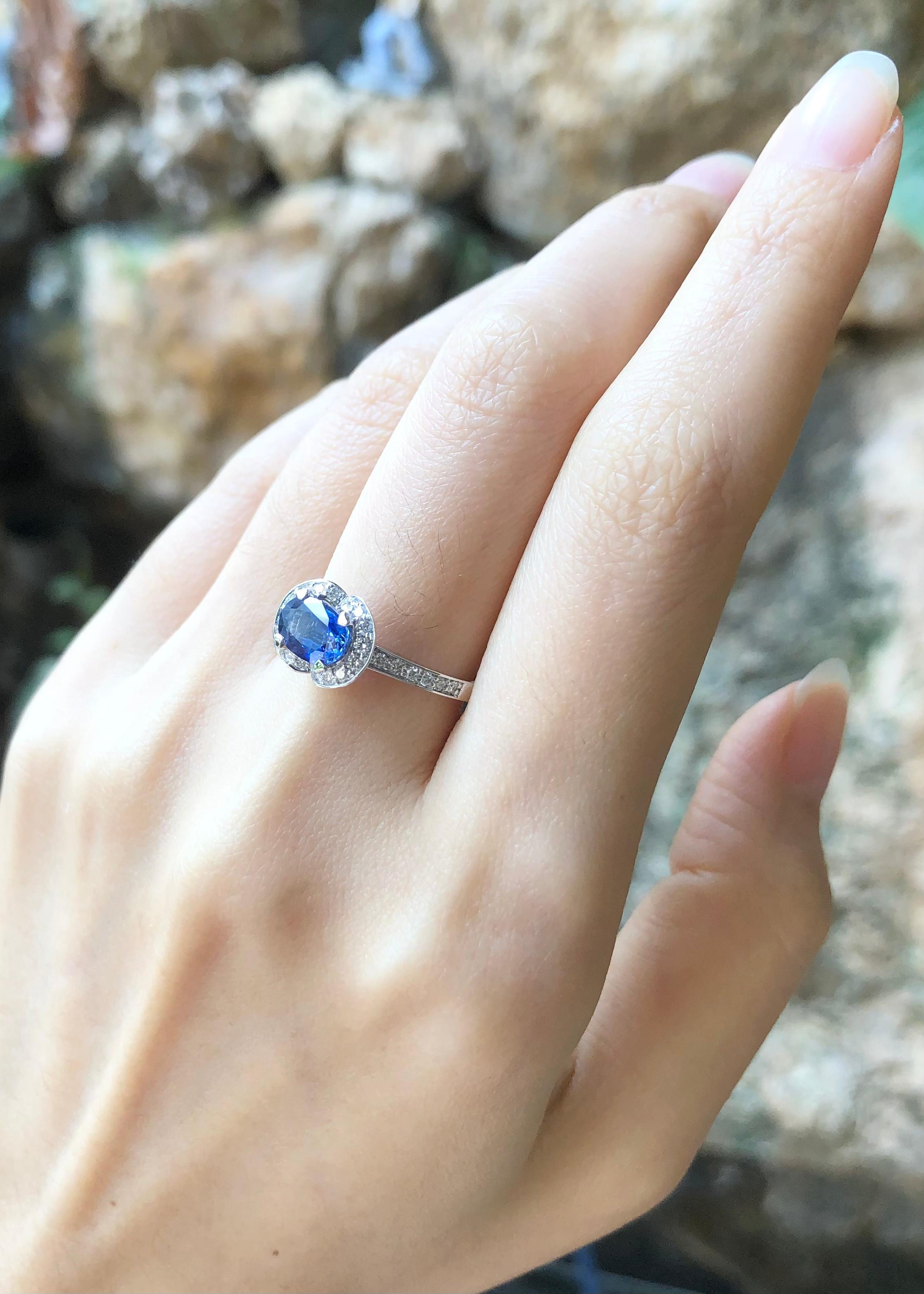 Blue Sapphire 1.06 carats with Diamond 0.25 carat Ring set in 18 Karat White Gold Settings

Width:  1.1 cm 
Length: 0.8 cm
Ring Size: 53
Total Weight: 3.39 grams



