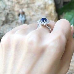 Blue Sapphire with Diamond Ring set in 18 Karat White Gold Settings