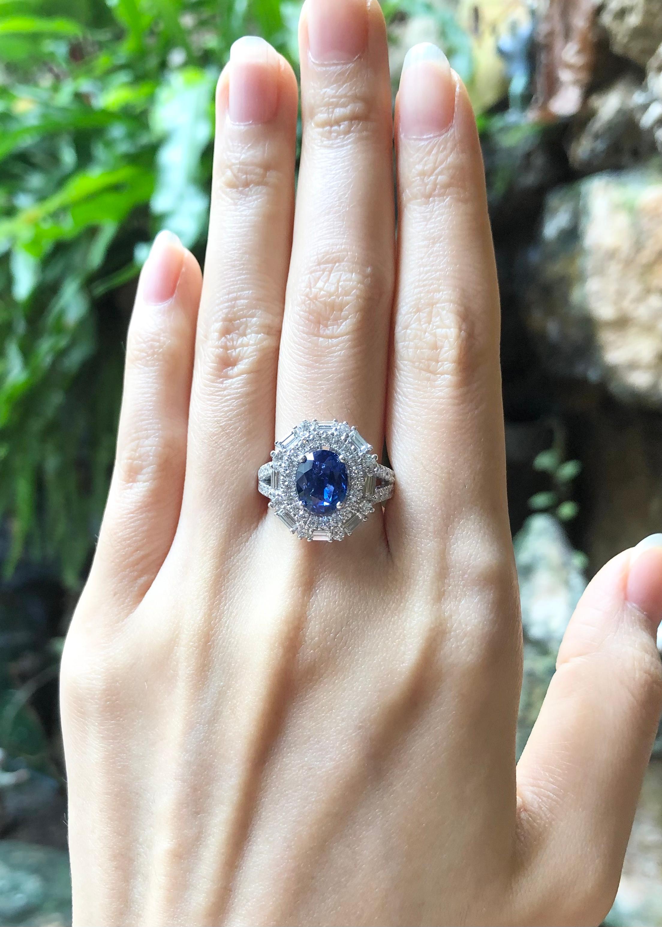 Blue Sapphire 2.50 carats with Diamond 1.28 carats Ring set in 18 Karat White Gold Settings

Width:  1.5 cm 
Length: 1.6 cm
Ring Size: 54
Total Weight: 10.58 grams



