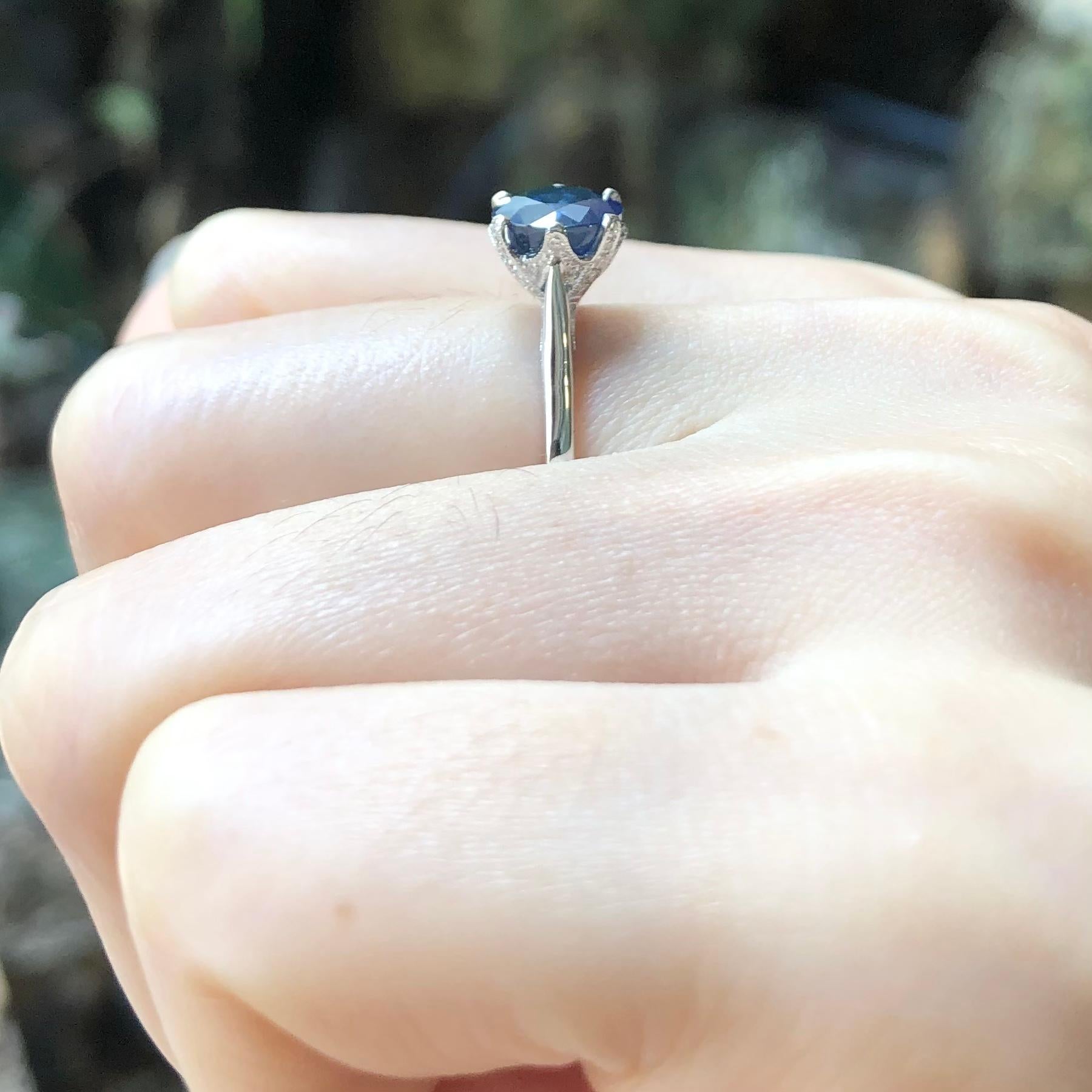 Blue Sapphire 2.15 carats with Diamond 0.08 carat Ring set in 18 Karat White Gold Settings

Width:  0.8 cm 
Length: 0.8 cm
Ring Size: 50
Total Weight: 3.16 grams



