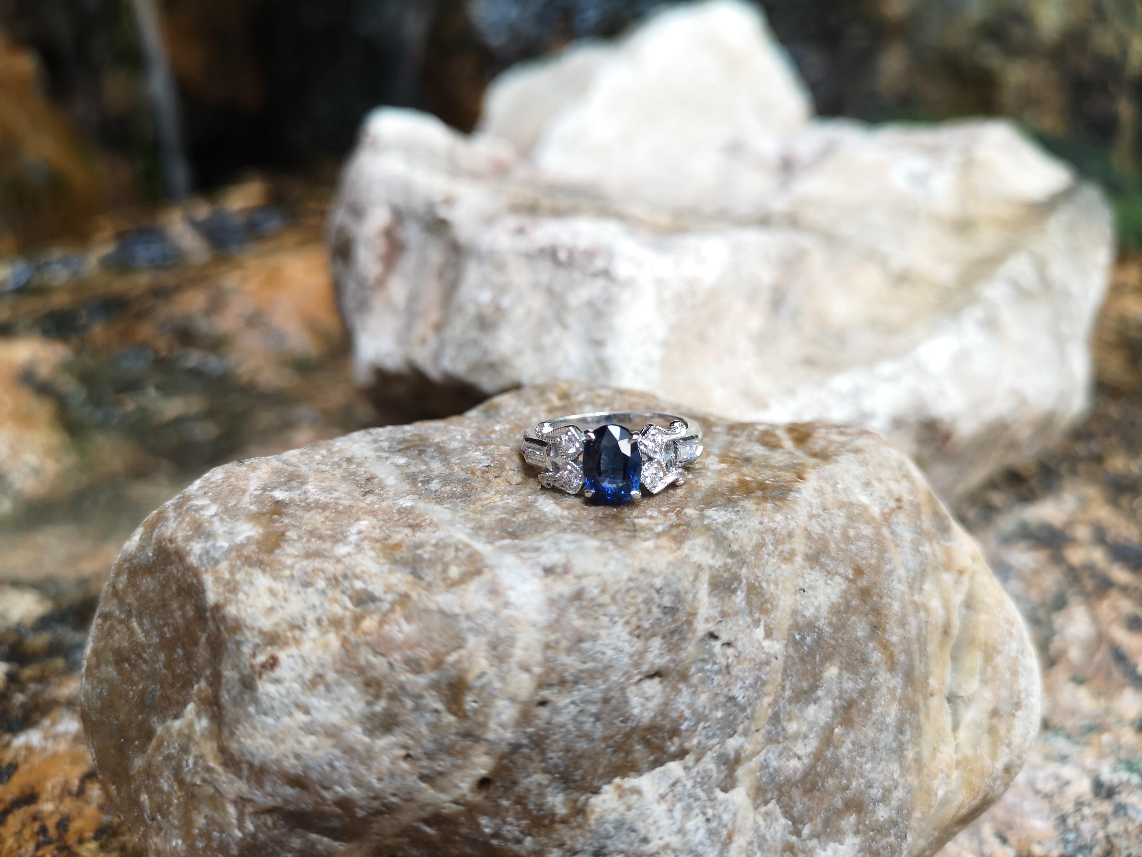 Oval Cut Blue Sapphire with Diamond Ring Set in 18 Karat White Gold Settings For Sale