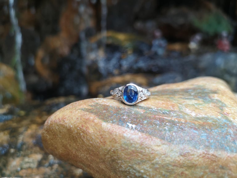 Edwardian Blue Sapphire with Diamond Ring Set in 18 Karat White Gold Settings For Sale